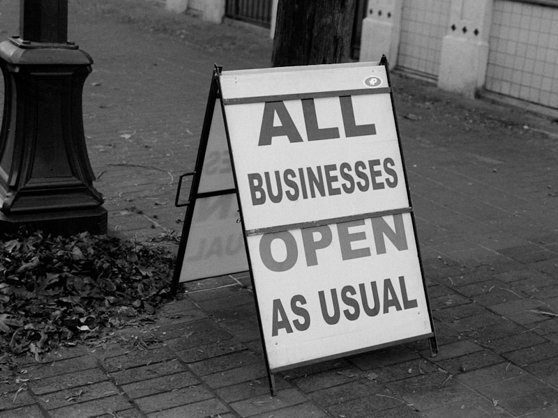 Small business owner reviewing payroll documentation